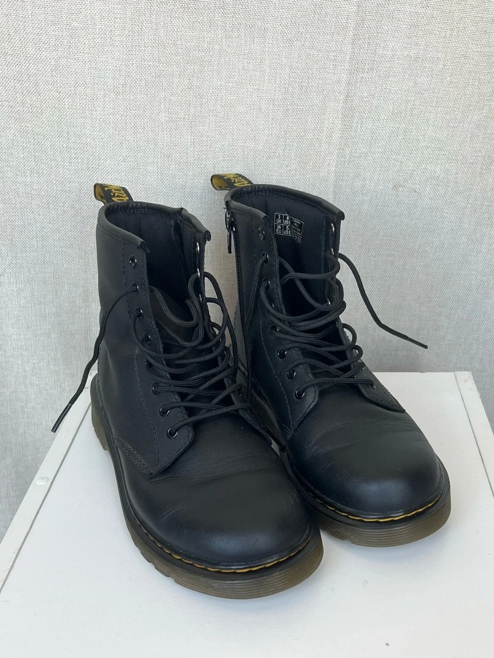 Dr. Martens Black Leather 8-Eye Lace-Up Boots with Yellow Stitching